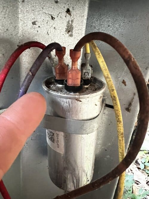 closeup of a damaged capacitor