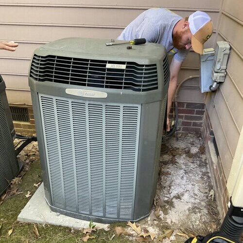 technician providing emergency HVAC repair